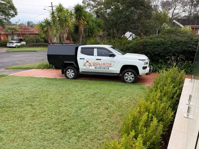 A branded Goliath Pest Solutions service vehicle at a Sydney residential job.