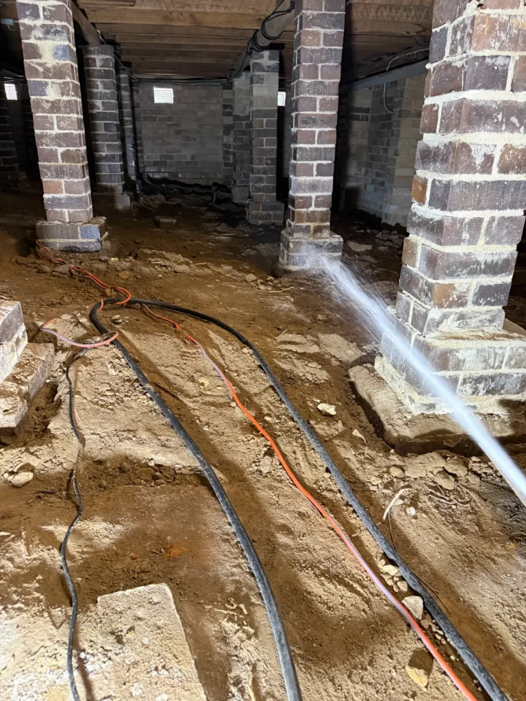 Termidor HE application at base of subfloor brick pier in Epping house