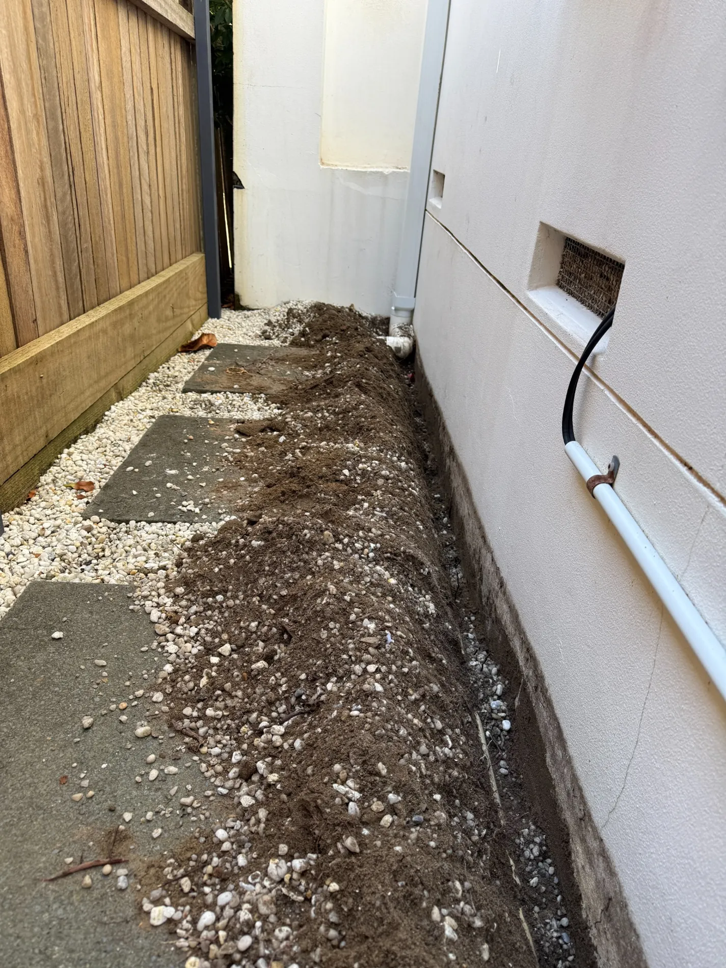 Excavated trench beside the external wall at a Maroubra termite prevention installation